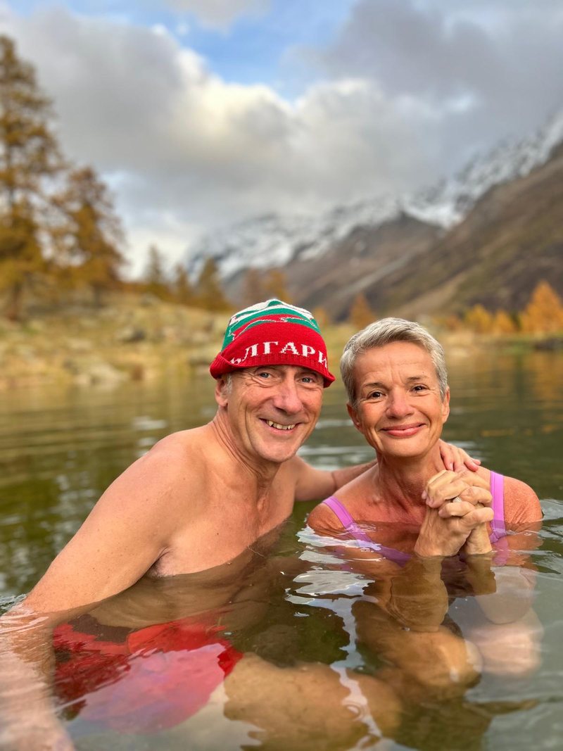 Andrea and Ralf bathing in a mountain lake, Ralf wearing a Bulgaria cap